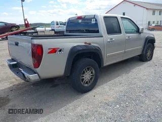 2009 GMC Canyon SLE1 z VIN 1GTDT13E398100890, wystawiony jako IAAI lot #42030572 z przebiegiem 160 181 mil mil oraz . Historia ofert i sprzedaży dostępna na DreamBid. Obrazek 4.