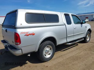 1999 Ford F-150 XL with VIN 2FTRX18LXXCA77730, listed as a IAAI auction lot 42181915 with 240,164 mi miles and . Bid and sale history available at DreamBid. Image 4.