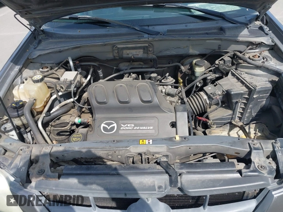 2003 Mazda Tribute LX with VIN 4F2YZ04193KM08890, listed as a IAAI auction lot 42158385 with 282,314 mi miles and . Bid and sale history available at carsss.com. Image 10.
