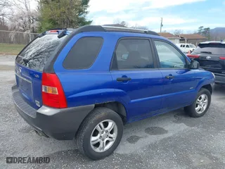 2008 Kia Sportage LX with VIN KNDJE723487477667, listed as a IAAI auction lot 41881032 with 225,840 mi miles. Bid and sale history available at carsss.com. Image 6.