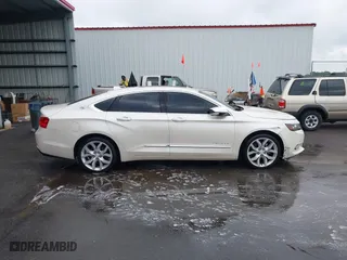 2014 Chevrolet Impala LTZ with VIN 1G1155S38EU105260, listed as a IAAI auction lot 42012082 with 230,407 mi miles. Bid and sale history available at carsss.com. Image 13.