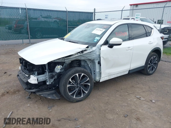 2022 Mazda CX-5 2.5 S Premium Plus Package with VIN JM3KFBEM2N0616960, listed as a IAAI auction lot 42127024 with 30,565 mi miles. Bid and sale history available at carsss.com. Image 2.