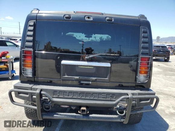 2003 Hummer H2 with VIN 5GRGN23U73H122529, listed as a Copart auction lot 50157934 with 0 mi miles and Salvage Title. Bid and sale history available at carsss.com. Image 6.