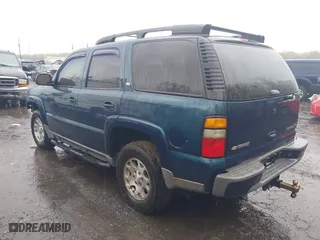 2005 Chevrolet Tahoe LT with VIN 1GNEK13T75R253693, listed as a IAAI auction lot 42013420 with 152,952 mi miles. Bid and sale history available at carsss.com. Image 3.