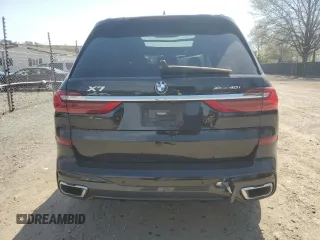 2022 BMW X7 xDrive40i z VIN 5UXCW2C07N9L74738, wystawiony jako Copart lot #53938795 z przebiegiem Nie podano mil oraz Szkoda całkowita • Salvage title. Historia ofert i sprzedaży dostępna na DreamBid. Obrazek 6.