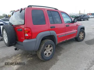 2003 Jeep Liberty Sport with VIN 1J4GL48K03W608325, listed as a IAAI auction lot 42033270 with 210,609 mi miles. Bid and sale history available at carsss.com. Image 4.