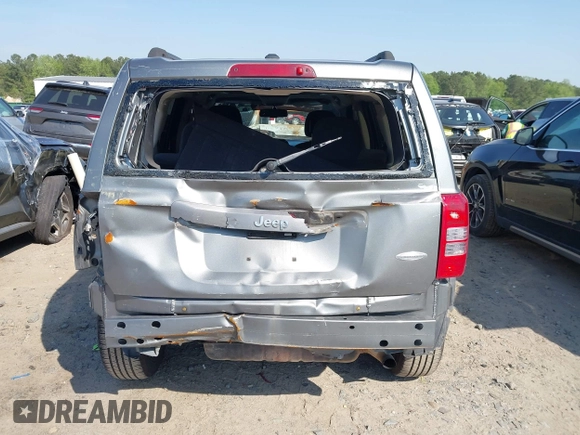 2014 Jeep Patriot Latitude with VIN 1C4NJPFA4ED535148, listed as a IAAI auction lot 42037942 with 192,493 mi miles and . Bid and sale history available at carsss.com. Image 16.