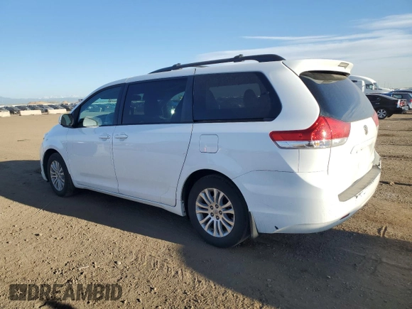 2012 Toyota Sienna XLE AAS with VIN 5TDYK3DC9CS197755, listed as a Copart auction lot 52903235 with 146,440 mi miles and Salvage Title. Bid and sale history available at carsss.com. Image 2.