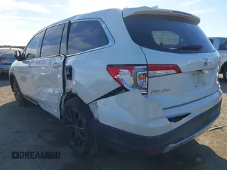 2019 Honda Pilot EX-L with VIN 5FNYF5H59KB017415, listed as a IAAI auction lot 41340852 with 125,433 mi miles and . Bid and sale history available at DreamBid. Image 3.