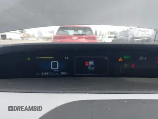 2021 Toyota Prius LE z VIN JTDKAMFP0M3179016, wystawiony jako IAAI lot #42204095 z przebiegiem 34 691 mil mil oraz . Historia ofert i sprzedaży dostępna na DreamBid. Obrazek 7.