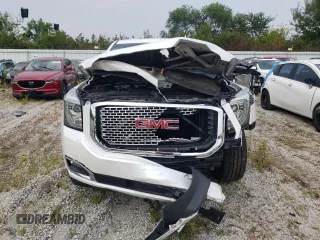 2016 GMC Yukon SLT with VIN 1GKS2BKC0GR265761, listed as a Copart auction lot 65645484 with 130,352 mi miles and Salvage Title. Bid and sale history available at carsss.com. Image 5.