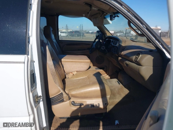 2000 Dodge Ram 1500 with VIN 1B7HC13Z3YJ191235, listed as a IAAI auction lot 41414124 with 180,098 mi miles. Bid and sale history available at carsss.com. Image 5.