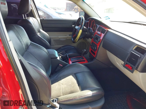 2006 Dodge Charger R/T with VIN 2B3KA53H36H500082, listed as a IAAI auction lot 42041310 with 216,989 mi miles and . Bid and sale history available at carsss.com. Image 5.