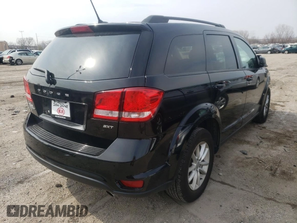 2017 Dodge Journey SXT with VIN 3C4PDDBG8HT520725, listed as a Copart auction lot 38070542 with 103,325 mi miles and Salvage title. Bid and sale history available at DreamBid. Image 4.