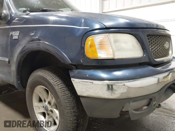 2003 Ford F-150 XLT z VIN 1FTRW08L73KC11631, wystawiony jako IAAI lot #42673130 z przebiegiem 188 945 mil mil oraz . Historia ofert i sprzedaży dostępna na DreamBid. Obrazek 6.