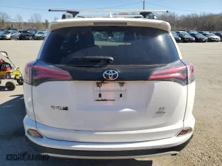 2017 Toyota RAV4 SE with VIN JTMJFREV3HJ715095, listed as a Copart auction lot 49233875 with 74,950 mi miles and Salvage Title. Bid and sale history available at carsss.com. Image 6.