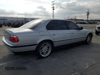 1999 BMW 7 Series 740il with VIN WBAGH8332XDP02624, listed as a Copart auction lot 72588834 with 100,650 mi miles and Salvage Title. Bid and sale history available at carsss.com. Image 3.