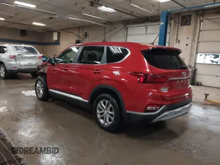 2019 Hyundai Santa Fe SE z VIN 5NMS2CAD3KH125454, wystawiony jako IAAI lot #42400534 z przebiegiem 75 155 mil mil oraz . Historia ofert i sprzedaży dostępna na DreamBid. Obrazek 3.