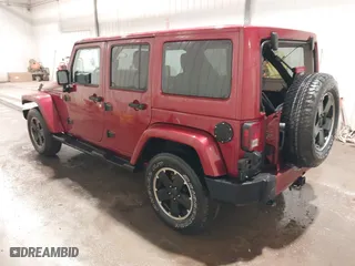 2012 Jeep Wrangler Unlimited Sahara with VIN 1C4BJWEG0CL256852, listed as a IAAI auction lot 41765640 with 171,408 mi miles. Bid and sale history available at carsss.com. Image 3.