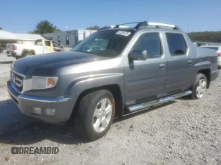 2009 Honda Ridgeline RTL with VIN 2HJYK16529H502325, listed as a Copart auction lot 52554535 with 167,744 mi miles and Salvage title. Bid and sale history available at DreamBid. Image 1.