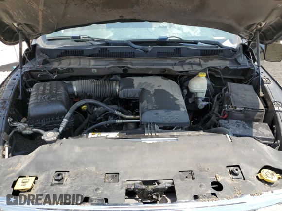 2014 Ram 1500 Lone Star z VIN 1C6RR6LG5ES114085, wystawiony jako Copart lot #66417334 z przebiegiem 168 847 mil mil oraz Szkoda całkowita • Salvage title. Historia ofert i sprzedaży dostępna na DreamBid. Obrazek 12.