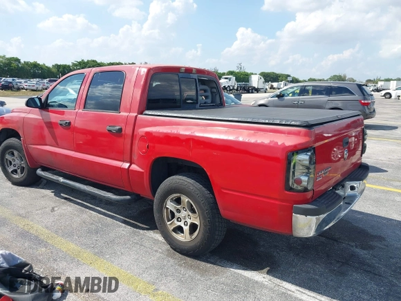 2006 Dodge Dakota SLT with VIN 1D7HE48K06S517772, listed as a IAAI auction lot 41946417 with 255,236 mi miles and . Bid and sale history available at carsss.com. Image 3.