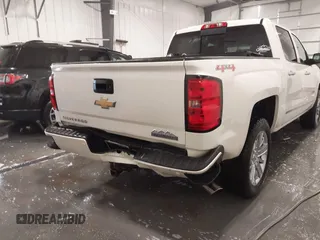 2014 Chevrolet Silverado 1500 High Country with VIN 3GCUKTEC4EG527722, listed as a IAAI auction lot 41978841 with 104,492 mi miles and . Bid and sale history available at DreamBid. Image 6.