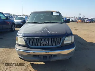1999 Ford F-150 with VIN 2FTRX17L8XCB23329, listed as a IAAI auction lot 41448347 with 223,517 mi miles and . Bid and sale history available at DreamBid. Image 6.