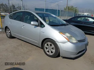 2007 Toyota Prius z VIN JTDKB20U673269842, wystawiony jako IAAI lot #42175044 z przebiegiem 270 741 mil mil oraz . Historia ofert i sprzedaży dostępna na DreamBid. Obrazek 1.