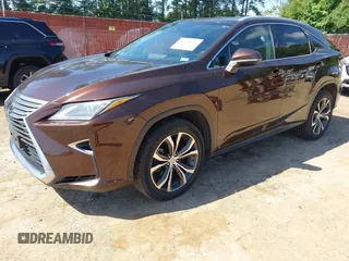 2016 Lexus RX 350 with VIN 2T2ZZMCA3GC005018, listed as a IAAI auction lot 42276197 with 136,692 mi miles and . Bid and sale history available at DreamBid. Image 2.