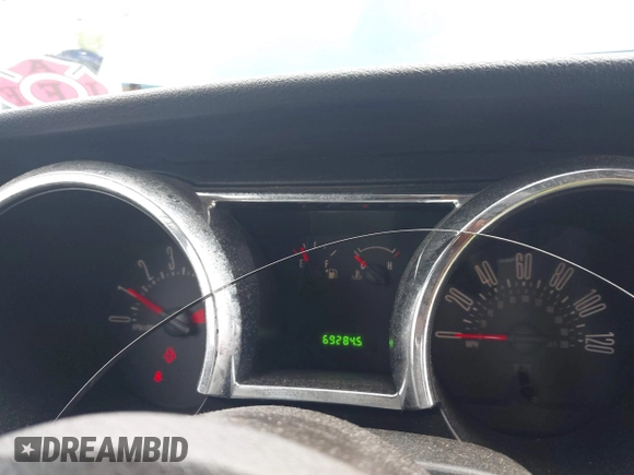 2009 Ford Mustang with VIN 1ZVHT80N795142637, listed as a IAAI auction lot 42595602 with 69,284 mi miles and . Bid and sale history available at DreamBid. Image 7.