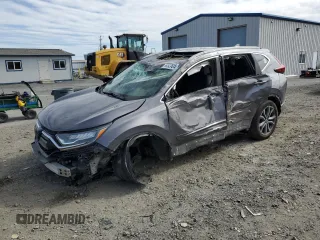 2022 Honda CR-V Touring z VIN 2HKRW2H90NH642944, wystawiony jako Copart lot #59527015 z przebiegiem 26 973 mil mil oraz Szkoda całkowita • Salvage title. Historia ofert i sprzedaży dostępna na DreamBid. Obrazek 1.