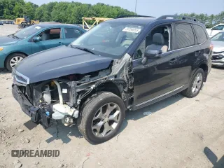 2016 Subaru Forester Touring z VIN JF2SJAXC8GH502988, wystawiony jako Copart lot #59789055 z przebiegiem 111 559 mil mil oraz Szkoda całkowita • Salvage title. Historia ofert i sprzedaży dostępna na DreamBid. Obrazek 1.