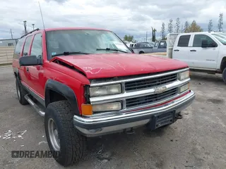 1996 Chevrolet Suburban with VIN 1GNGK26J6TJ327156, listed as a IAAI auction lot 41858544 with 195,532 mi miles. Bid and sale history available at carsss.com. Image 1.