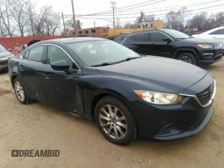 2015 Mazda Mazda6 i Sport with VIN JM1GJ1U51F1185105, listed as a IAAI auction lot 41287570 with 133,016 mi miles. Bid and sale history available at carsss.com. Image 1.