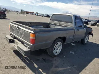 1987 Toyota Pickup with VIN JT4RN50R5H0228706, listed as a Copart auction lot 50639045 with 296,043 mi miles and Salvage Title. Bid and sale history available at DreamBid. Image 3.