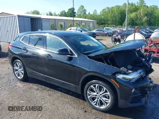 2018 BMW X2 sDrive28i z VIN WBXYJ3C34JEJ84230, wystawiony jako IAAI lot #42146469 z przebiegiem 53 369 mil mil oraz . Historia ofert i sprzedaży dostępna na DreamBid. Obrazek 1.