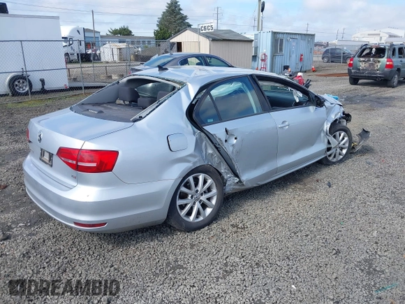 2015 Volkswagen Jetta Sedan 1.8T SE with VIN 3VWD17AJ3FM297573, listed as a IAAI auction lot 41884541 with 98,225 mi miles. Bid and sale history available at carsss.com. Image 4.