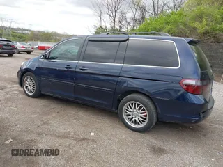 2007 Honda Odyssey EX-L with VIN 5FNRL38737B031255, listed as a IAAI auction lot 42040035 with 233,369 mi miles. Bid and sale history available at carsss.com. Image 3.