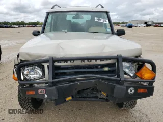 2002 Land Rover Discovery Cloth z VIN SALTY15482A752087, wystawiony jako Copart lot #69861824 z przebiegiem Nie podano mil oraz Szkoda całkowita • Salvage title. Historia ofert i sprzedaży dostępna na DreamBid. Obrazek 5.