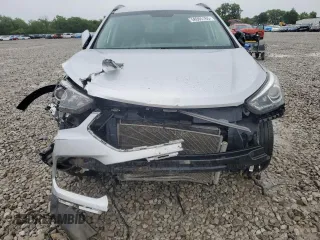 2017 Hyundai Santa Fe 2.4L z VIN 5XYZUDLB8HG500297, wystawiony jako Copart lot #58005165 z przebiegiem 91 871 mil mil oraz Szkoda całkowita • Salvage title. Historia ofert i sprzedaży dostępna na DreamBid. Obrazek 5.