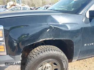 2014 Chevrolet Silverado 1500 Work Truck with VIN 3GCUKPEH5EG223592, listed as a IAAI auction lot 41909067 with 264,330 mi miles and . Bid and sale history available at DreamBid. Image 17.