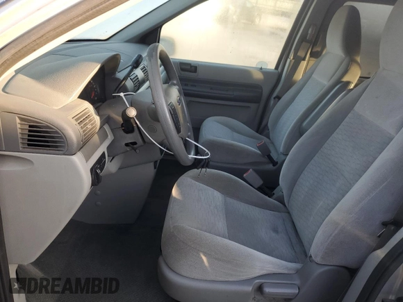 2005 Ford Freestar SE z VIN 2FMDA51635BA24020, wystawiony jako Copart lot #47605725 z przebiegiem 112 563 mil mil oraz Szkody całkowita. Historia ofert i sprzedaży dostępna na DreamBid. Obrazek 7.