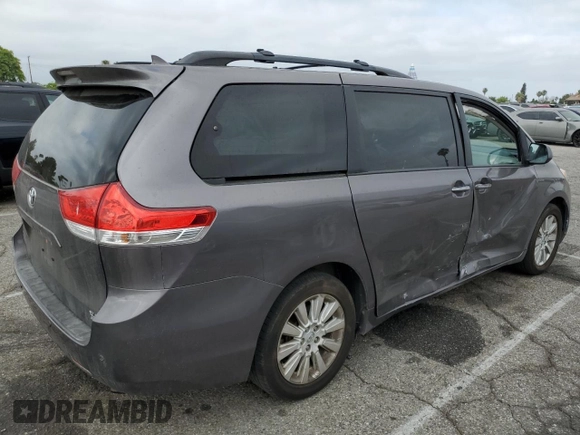 2014 Toyota Sienna Limited с VIN 5TDDK3DC6ES084587, выставлен на аукционе Copart как лот 62018095 с пробегом 152 124 миль миль и Списание • Salvage title. История ставок и продаж доступна на DreamBid. Изображение 3.