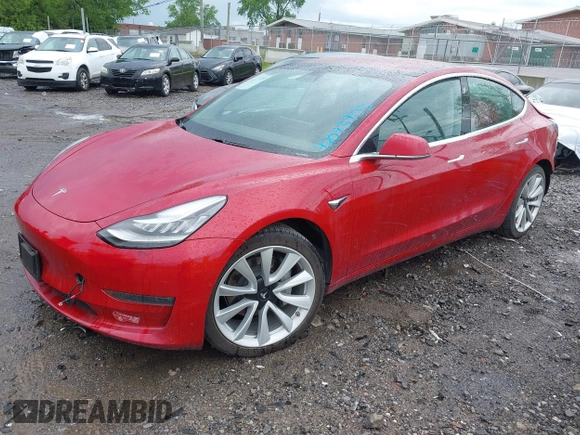 2018 Tesla Model 3 Long Range Battery with VIN 5YJ3E1EA6JF052659, listed as a IAAI auction lot 42093903 with 49,255 mi miles and . Bid and sale history available at DreamBid. Image 2.