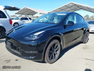 2024 Tesla Model Y with VIN 7SAYGDED6RF152657, listed as a IAAI auction lot 41265862 with NaN miles. Bid and sale history available at carsss.com. Image 17.
