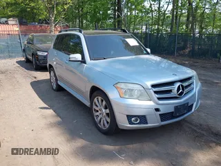 2010 Mercedes-Benz GLK with VIN WDCGG8HB4AF399020, listed as a IAAI auction lot 42180015 with 313,310 mi miles. Bid and sale history available at carsss.com. Image 1.