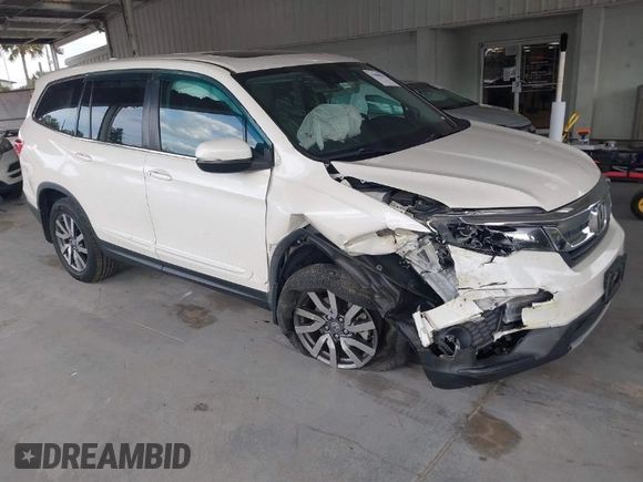 2019 Honda Pilot EX-L with VIN 5FNYF6H57KB011649, listed as a IAAI auction lot 41880951 with 99,504 mi miles. Bid and sale history available at carsss.com. Image 1.