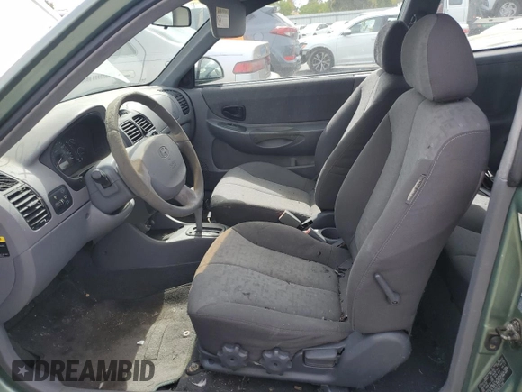 2003 Hyundai Accent GL with VIN KMHCG35C13U277732, listed as a Copart auction lot 72276634 with 135,176 mi miles and Salvage Title. Bid and sale history available at carsss.com. Image 7.