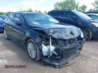 2014 Toyota Avalon Limited z VIN 4T1BD1EB8EU030288, wystawiony jako IAAI lot #42259957 z przebiegiem 162 850 mil mil oraz . Historia ofert i sprzedaży dostępna na DreamBid. Obrazek 1.